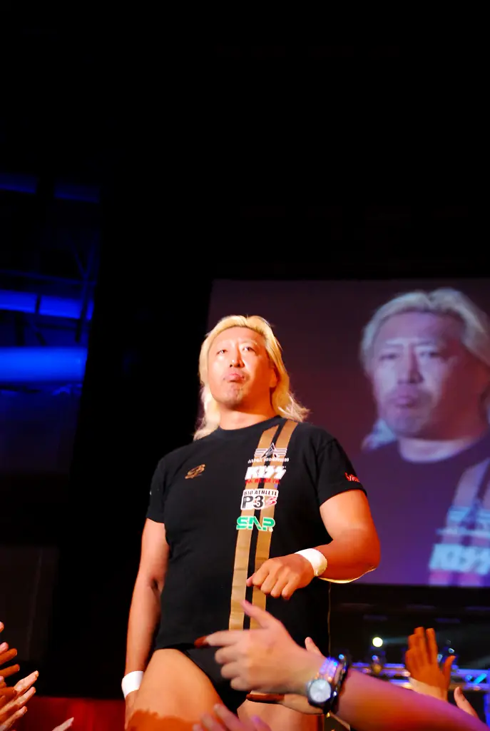 Yoshihiro Takayama, blond, walking to the ring